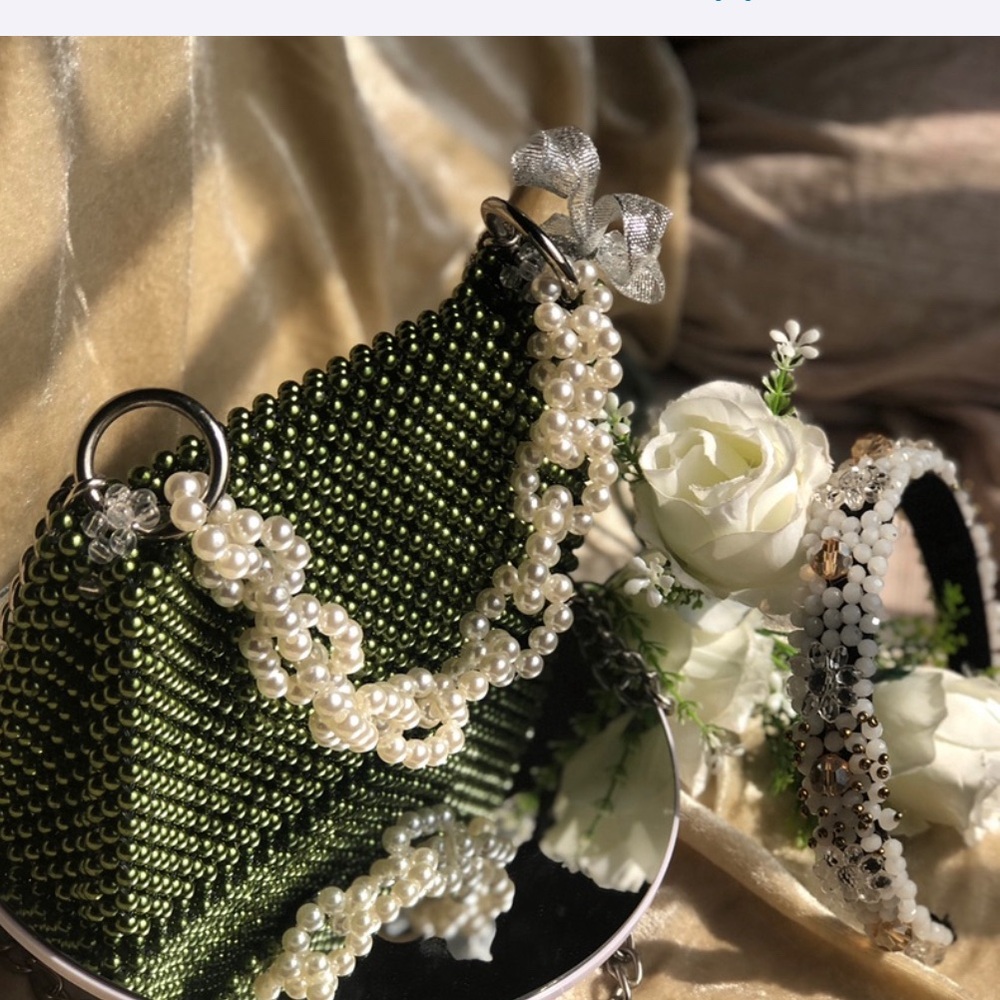 Homemade Duaba emerald green purse.